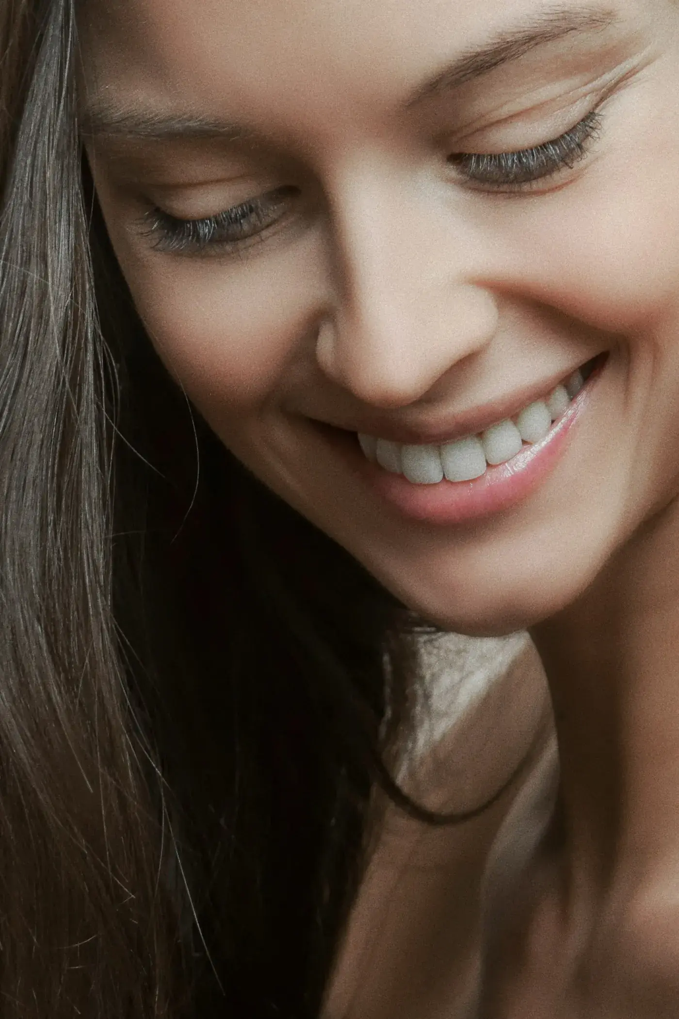 A woman with a healthy, confident smile